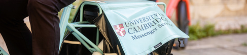 Image of a University Messaging Service pannier on a bicycle