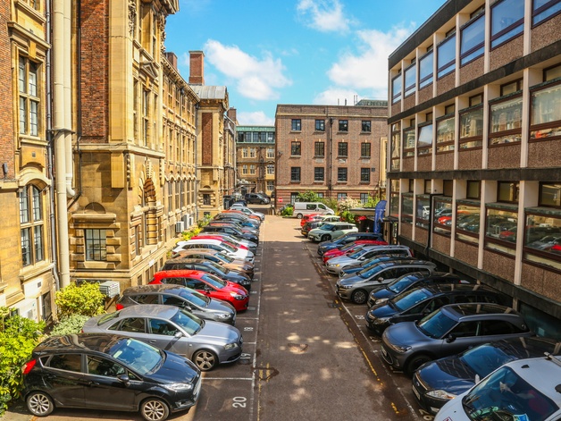 Cars parked on the Downing site
