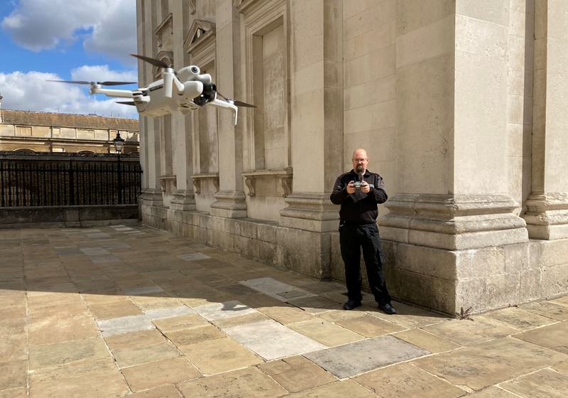 AV Team staff flying a drone in Cambridge